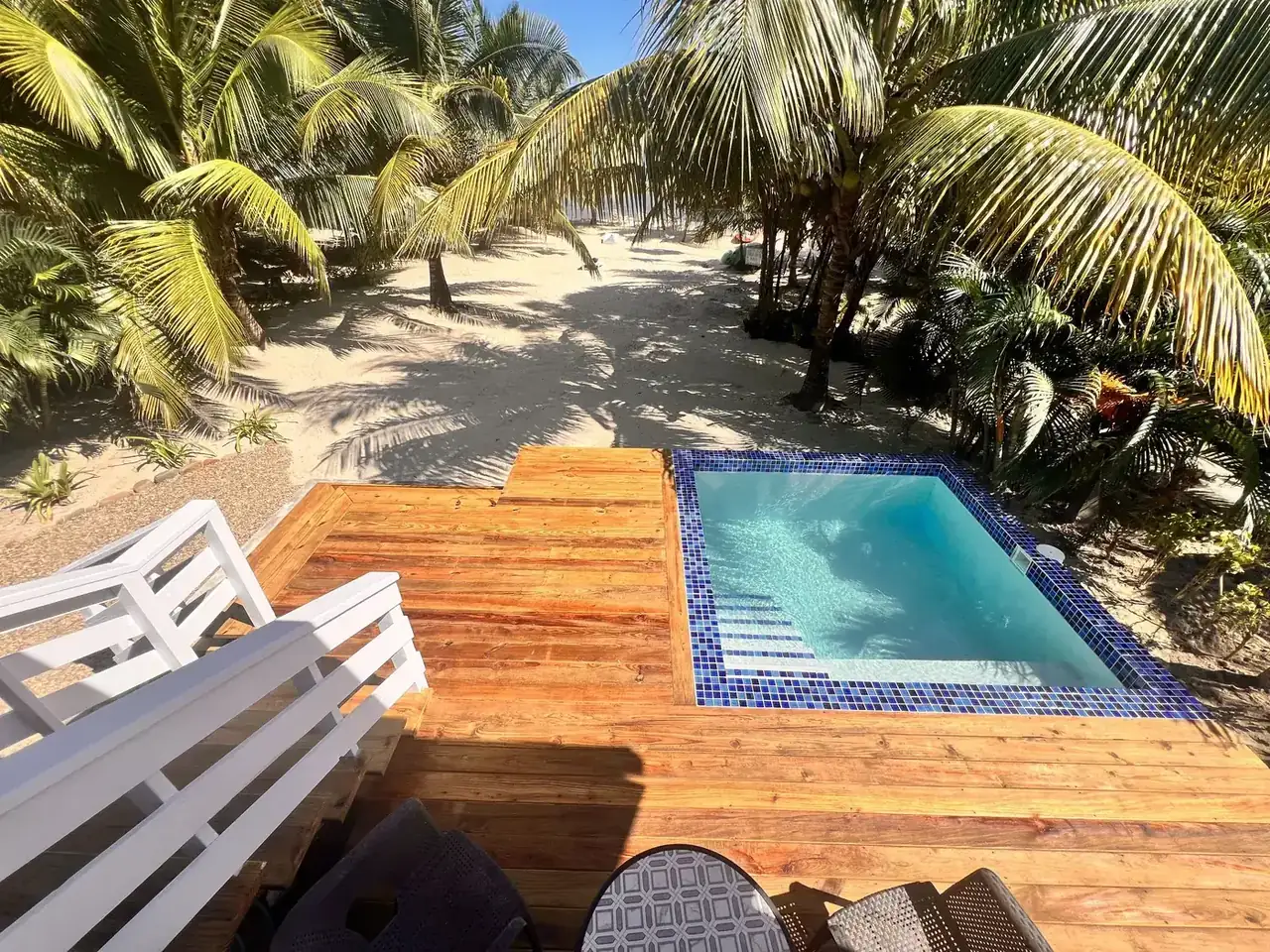 Casita deck and plunge pool, with the beach and palms beyond