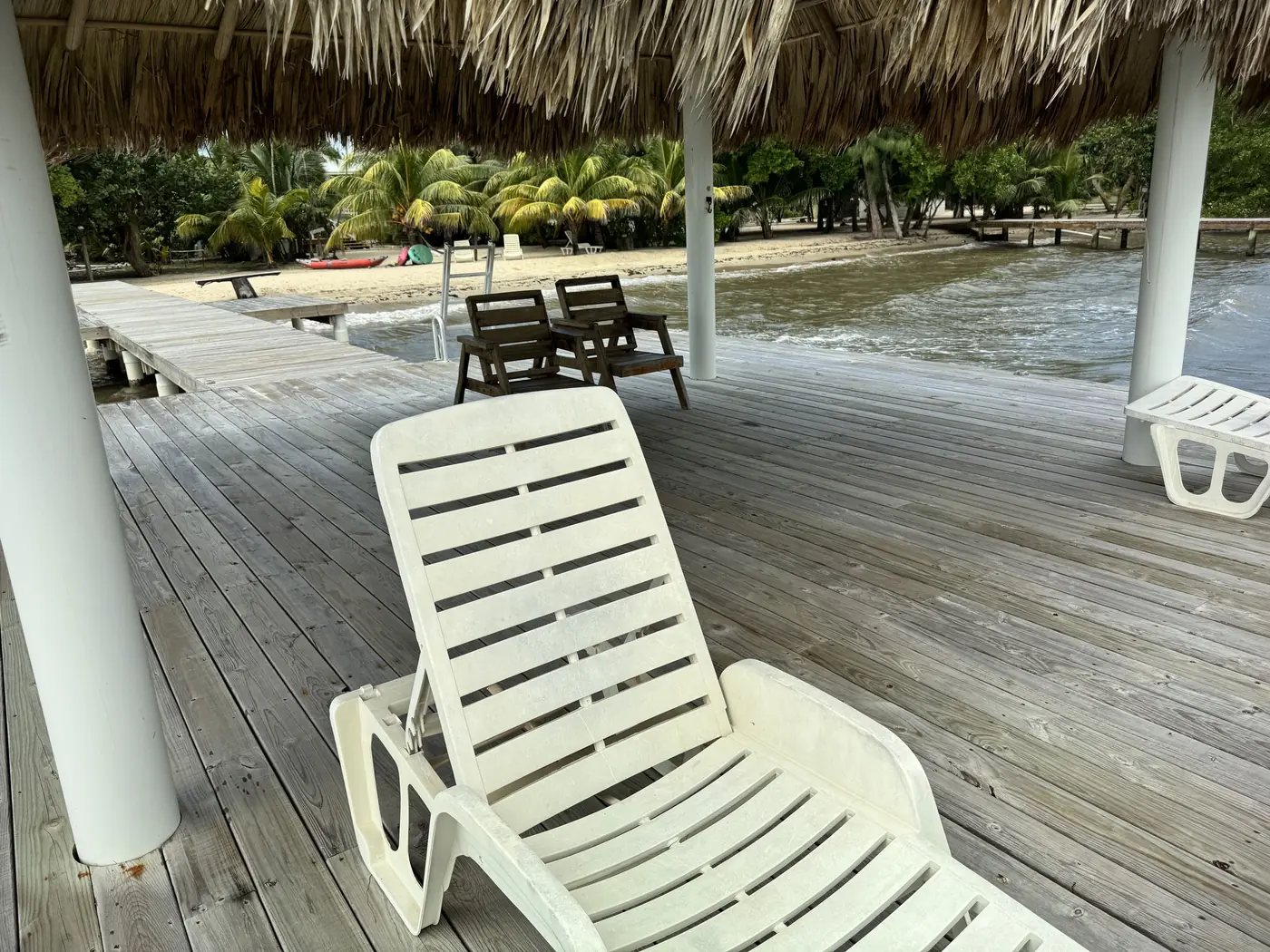 Lounge chairs on a thatched deck at La Vida