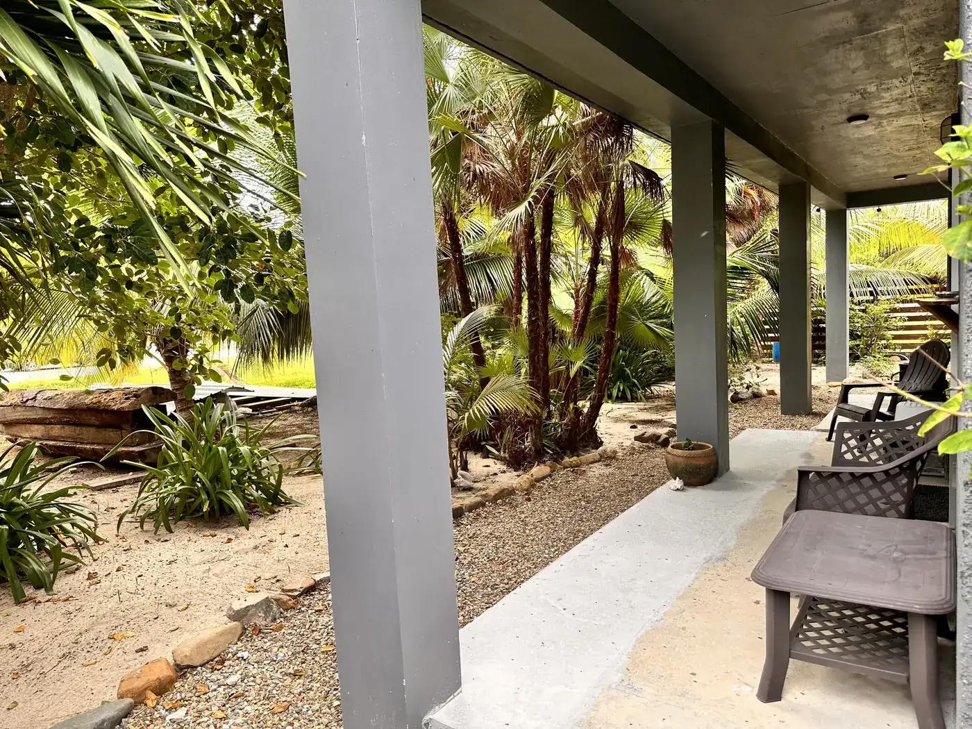 Chairs and a bench on the Studio’s covered porch